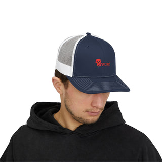 A person wearing a black graphic hoodie and a blue and white trucker hat with a red UNFLTRD logo prominently displayed on the front.