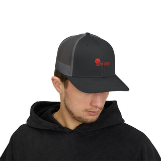 A person wearing a black graphic hoodie and a black baseball cap with a red logo. The cap has a mesh back and a curved brim.