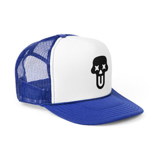 A blue and white trucker cap featuring a ghost face graphic with a playful expression on the front.