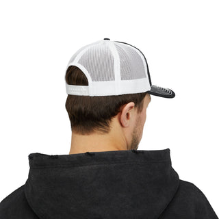 A rear view of a man wearing a black hoodie and a white mesh trucker cap with a black visor.