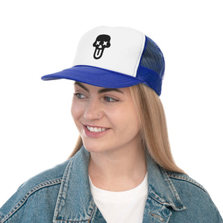 A women wearing a casual denim jacket and a white and blue snapback cap with a unique skull design.