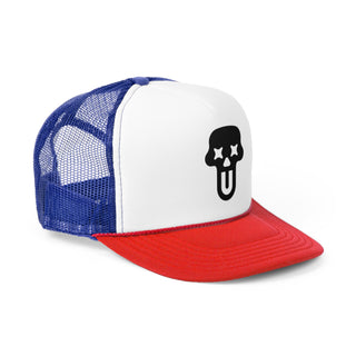 Red and white trucker cap with blue mesh and a black skull graphic on the front. Stylish and playful graphic trucker hat design for casual wear.