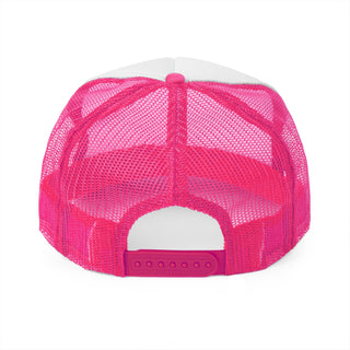 Bright pink mesh trucker hat with a white front panel and an adjustable snapback closure.